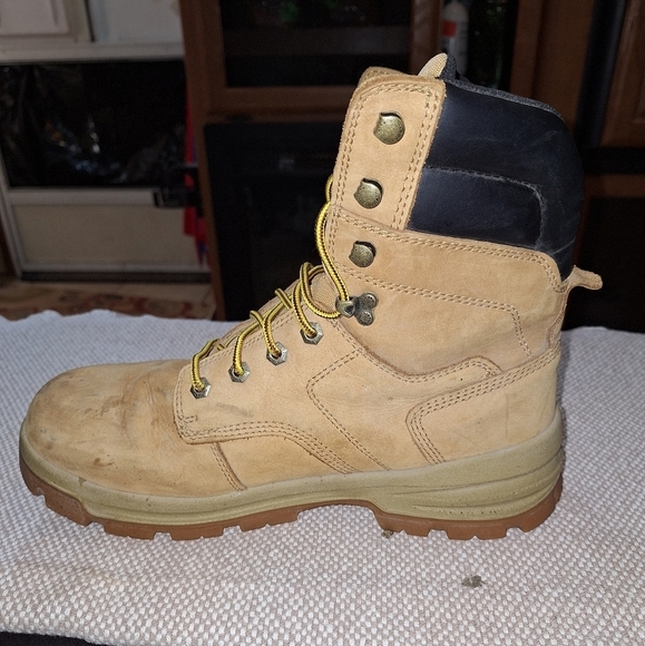 A pair of Herman Survivors leather boots in a men's size 11.5 Wide. Safety Toe. - Picture 11 of 12
